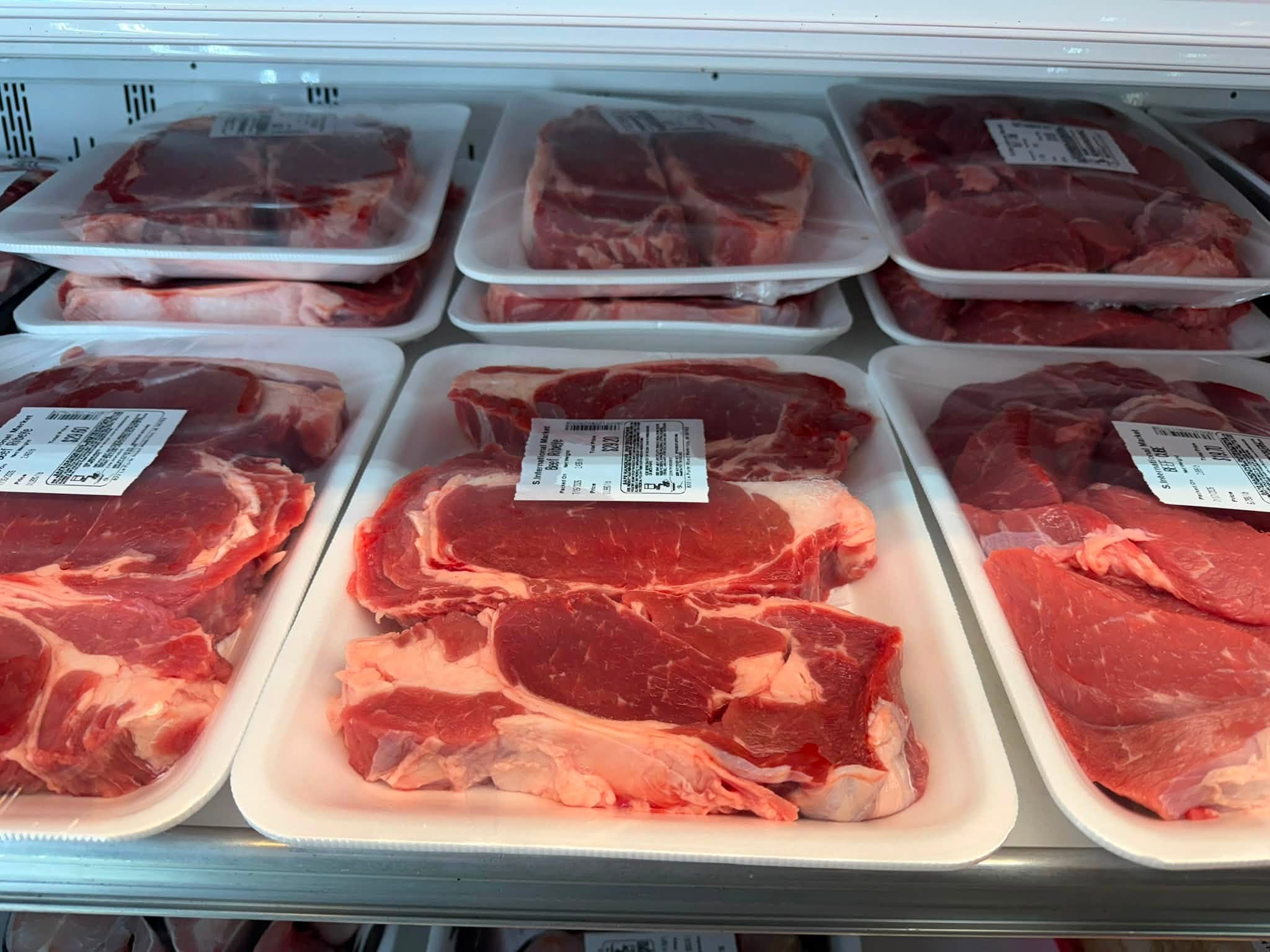 Packaged meat cuts in the refrigerated department