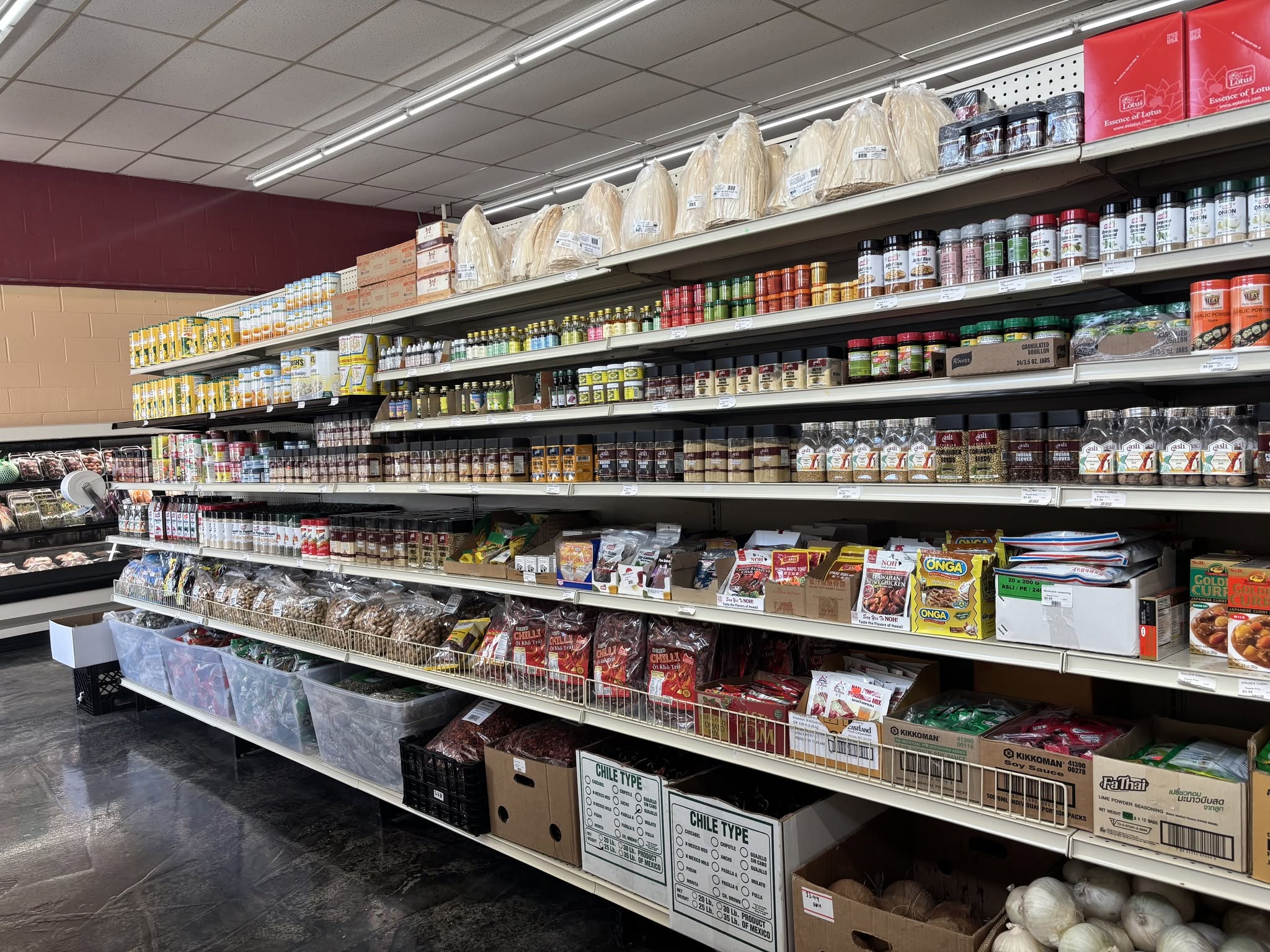 A stocked S International Market aisle