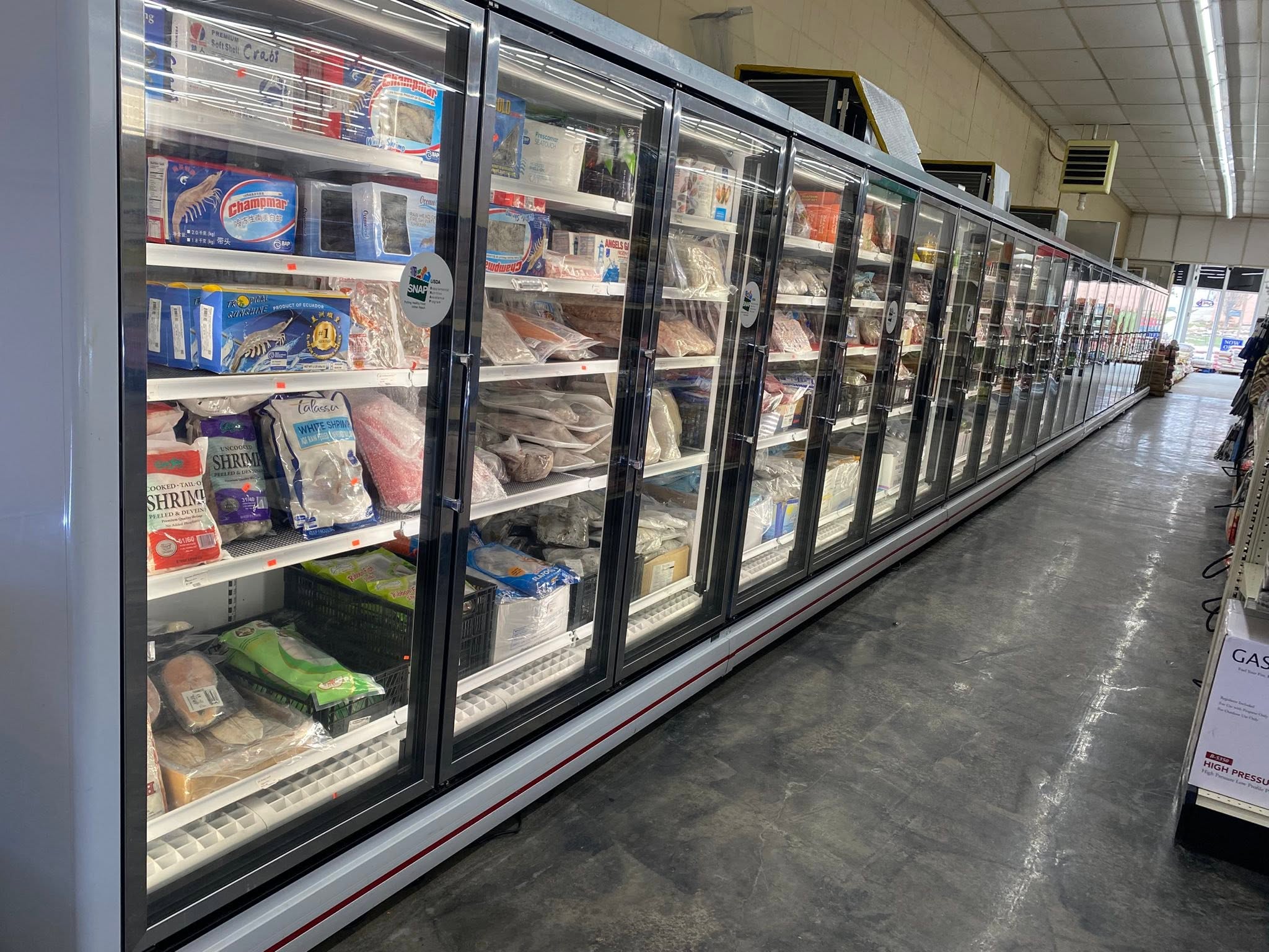 Produce and grocery shelves at the Waterloo market